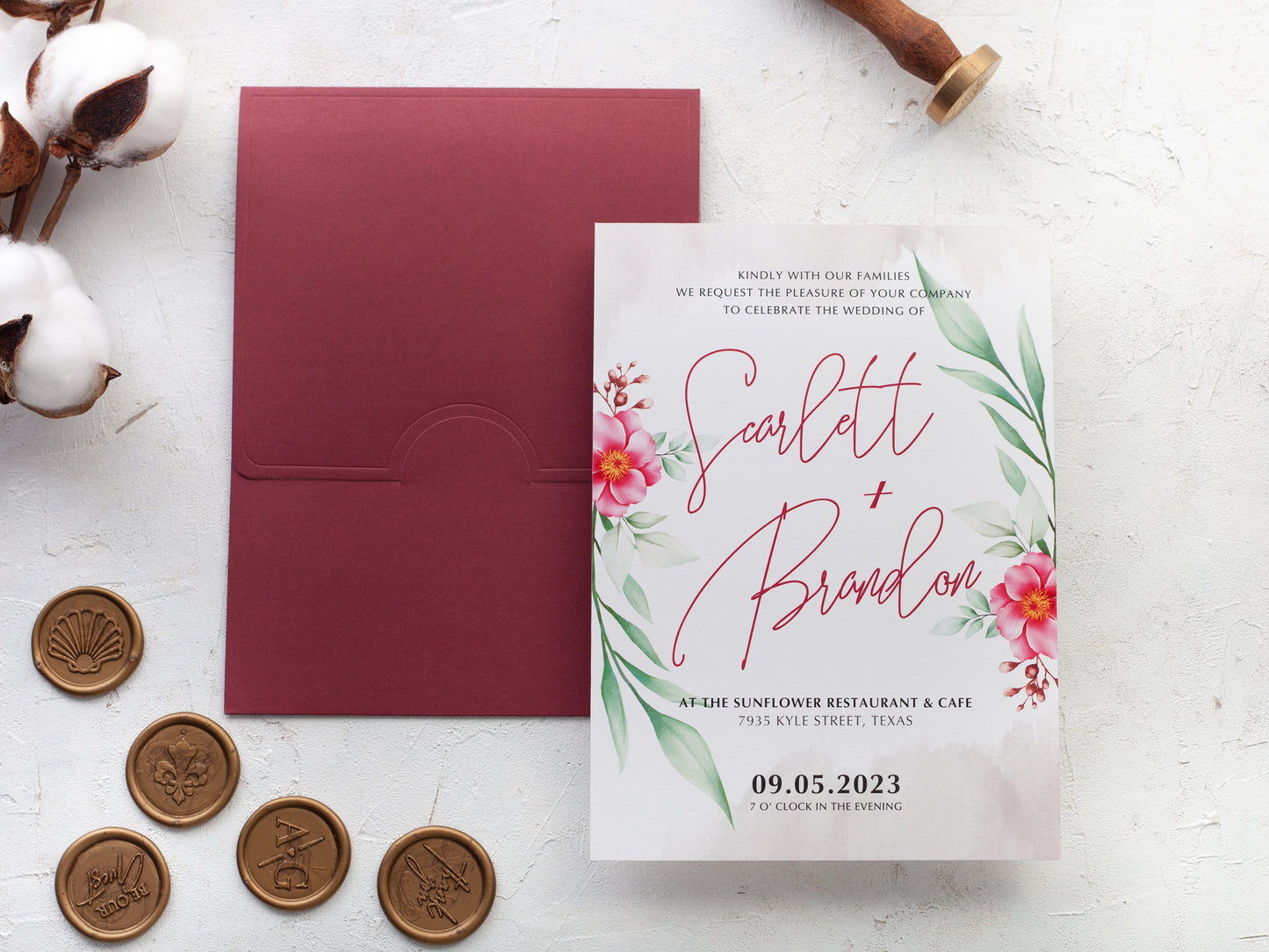 Floral wedding invitation with burgundy envelope