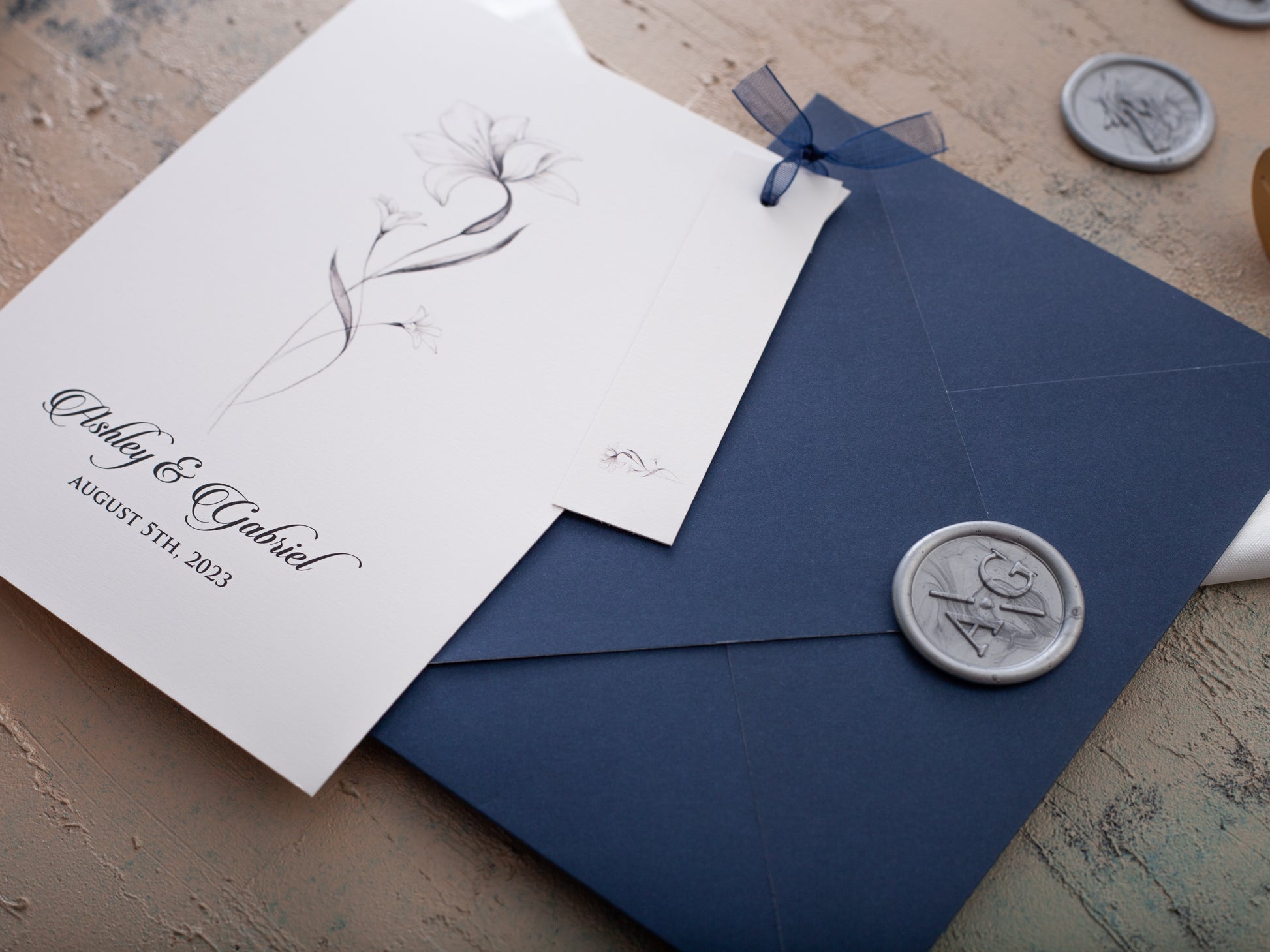 Navy blue wedding invitation with name tag