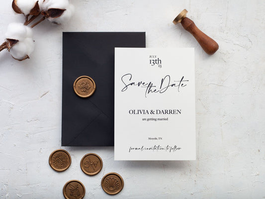 Wedding save the date, black envelope and gold wax seals